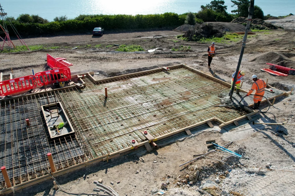 View of cement foundations being laid and steel frame support. DDG Group groundworks.