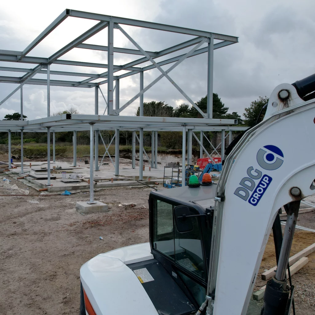 Steel frame construction on a site. DDG Group groundworks.